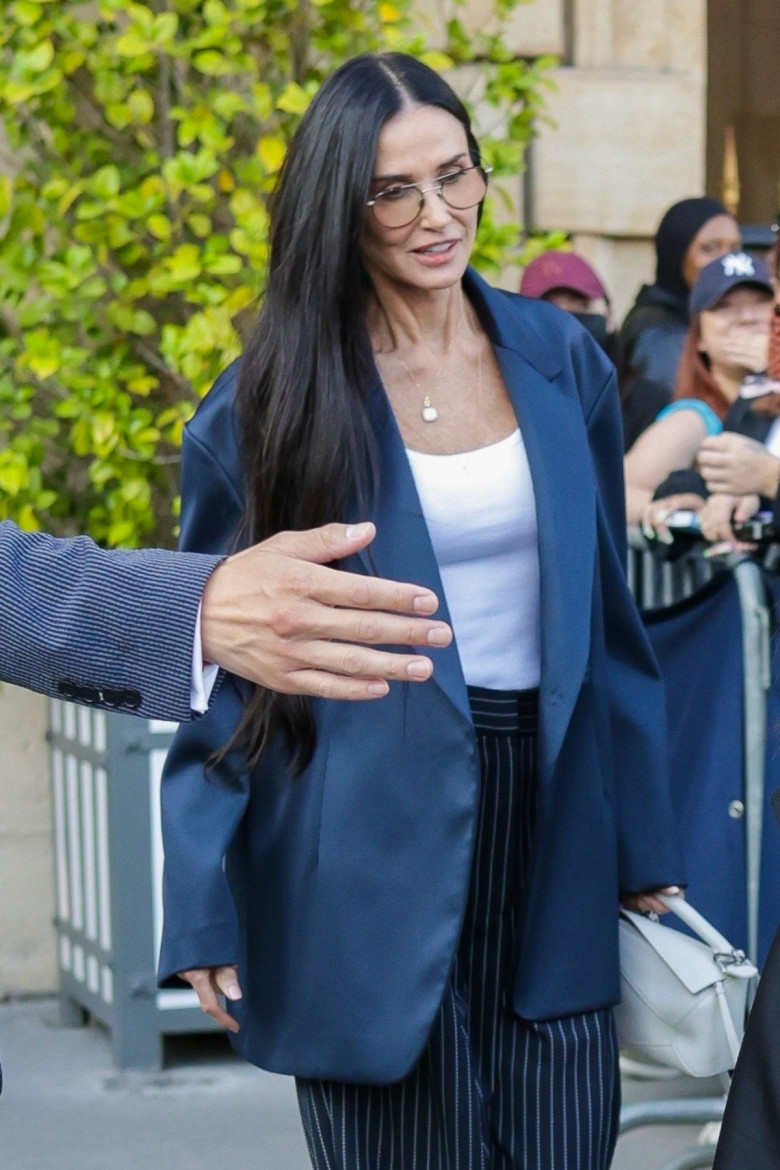 Demi Moore and daughter Scout leave the Crillon Hotel in Paris