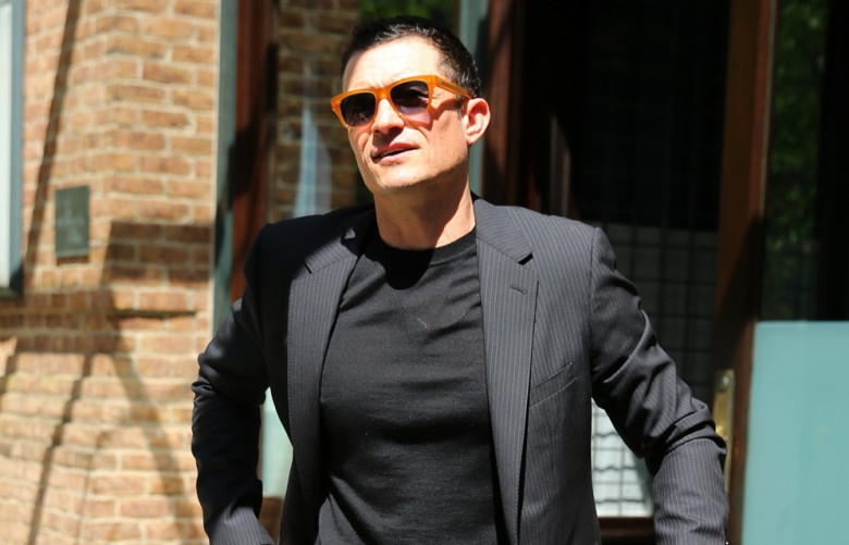 Orlando Bloom looks sharp in a suit as he leaves for 'Late Night with Seth Meyers'. in New York City