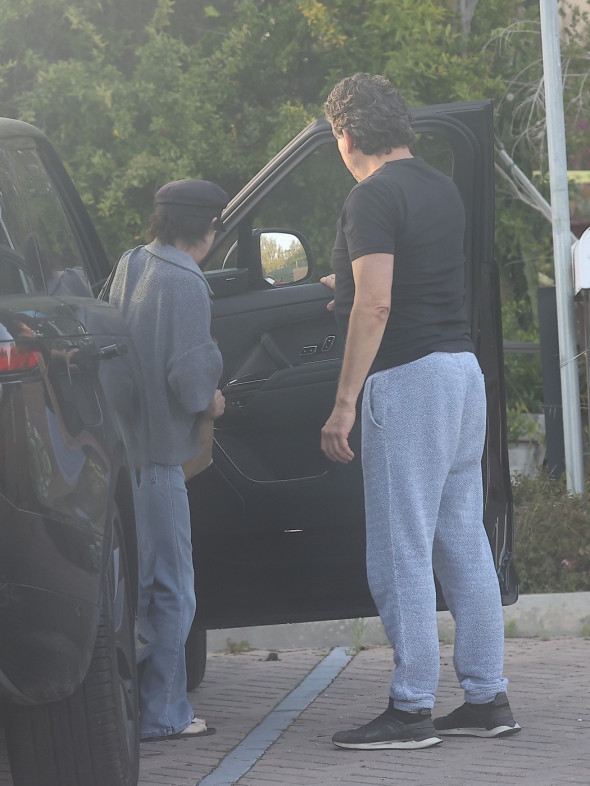 *EXCLUSIVE* Shannen Doherty and Chris Cortazzo share a sweet moment leaving Kristy's Malibu *Web Must Call for pricing*