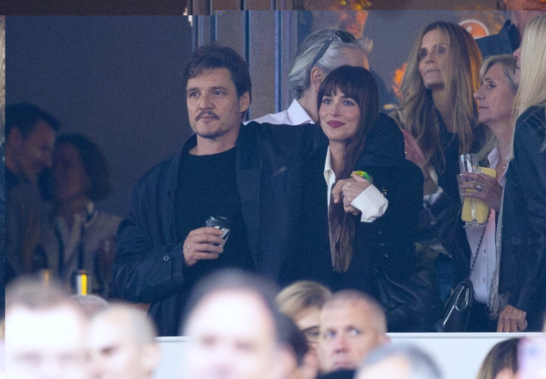 *PREMIUM-EXCLUSIVE* MUST CALL FOR PRICING BEFORE USAGE  - Dakota Johnson and her 'Materialists' co-star Pedro Pascal get real close dancing and laughing at the Stevie Nicks American Express Presents BST Hyde Park concert.*PICTURES TAKEN ON 12/07/2024*