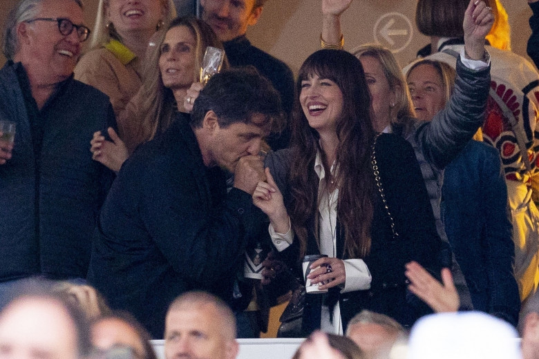 *PREMIUM-EXCLUSIVE* MUST CALL FOR PRICING BEFORE USAGE  - Dakota Johnson and her 'Materialists' co-star Pedro Pascal get real close dancing and laughing at the Stevie Nicks American Express Presents BST Hyde Park concert.*PICTURES TAKEN ON 12/07/2024*