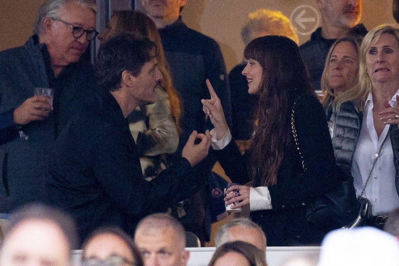 *PREMIUM-EXCLUSIVE* MUST CALL FOR PRICING BEFORE USAGE  - Dakota Johnson and her 'Materialists' co-star Pedro Pascal get real close dancing and laughing at the Stevie Nicks American Express Presents BST Hyde Park concert.*PICTURES TAKEN ON 12/07/2024*