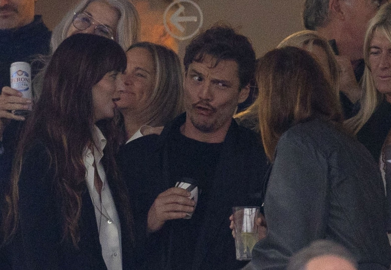 *PREMIUM-EXCLUSIVE* MUST CALL FOR PRICING BEFORE USAGE  - Dakota Johnson and her 'Materialists' co-star Pedro Pascal get real close dancing and laughing at the Stevie Nicks American Express Presents BST Hyde Park concert.*PICTURES TAKEN ON 12/07/2024*