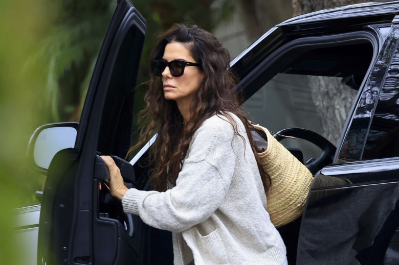 *EXCLUSIVE* Sandra Bullock is all smiles after leaving a dermatologist appointment in Beverly Hills as it was just recently announced she will be reprising her role in the sequel to the movie "Practical Magic"