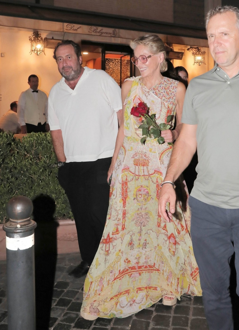 *EXCLUSIVE* The American Actress Sharon Stone looks in great spirits as she enjoys a spot of dinner with Gabriele Israilovici and son Laird at Dal Bolognese restaurant during a visit to the eternal city of Rome.