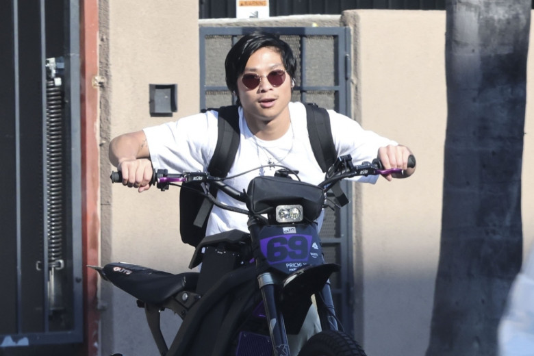 *EXCLUSIVE* Pax Jolie-Pitt enjoys a ride on his electric bike