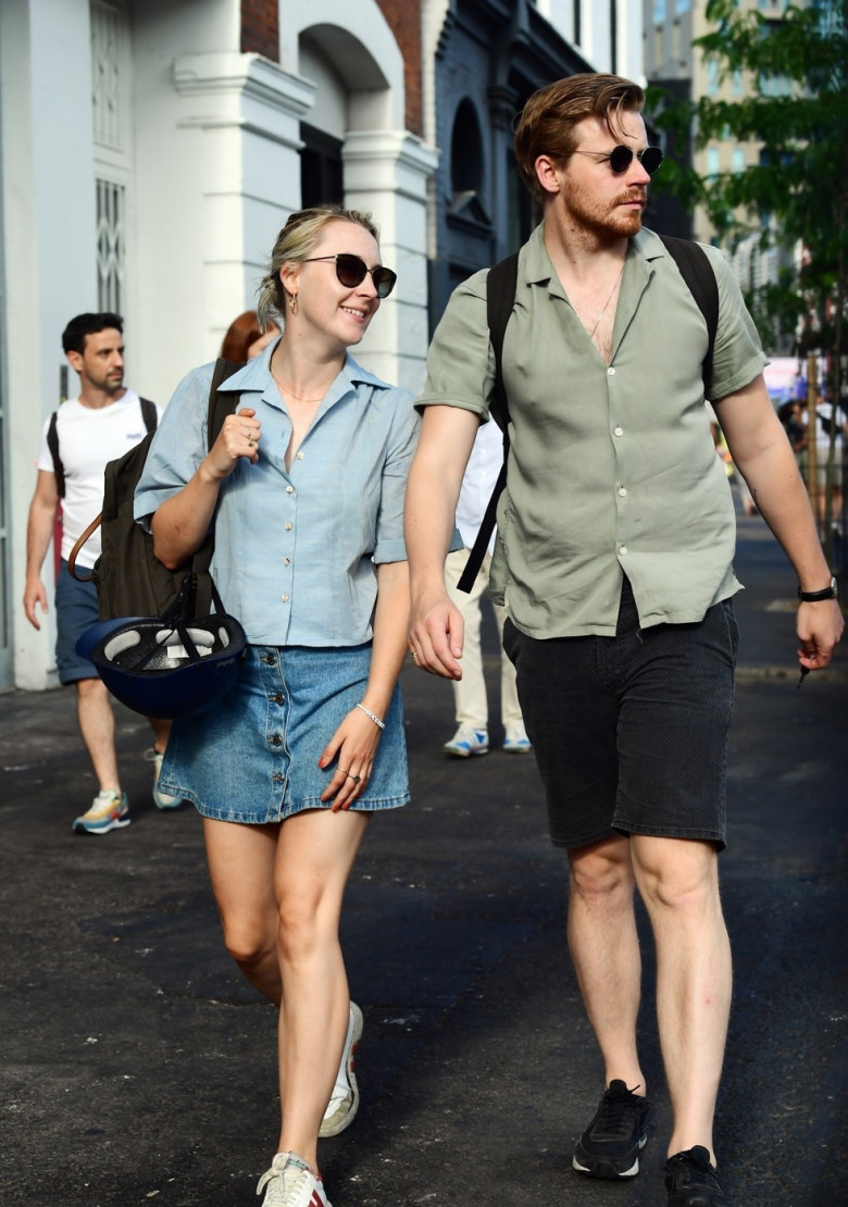 *EXCLUSIVE* American/Irish actress Saoirse Ronan and her actor boyfriend Jack Lowden are seen riding bikes in East London