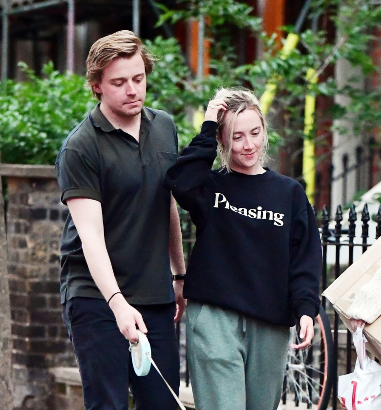 *PREMIUM-EXCLUSIVE* MUST CALL FOR PRICING BEFORE USAGE - STRICTLY NOT AVAILABLE FOR ONLINE USAGE UNTIL 23:20 PM UK TIME ON 12/06/2022 - The American-born Irish actress Saoirse Ronan and beau Jack Lowden donned a casual look whilst out with their new pup