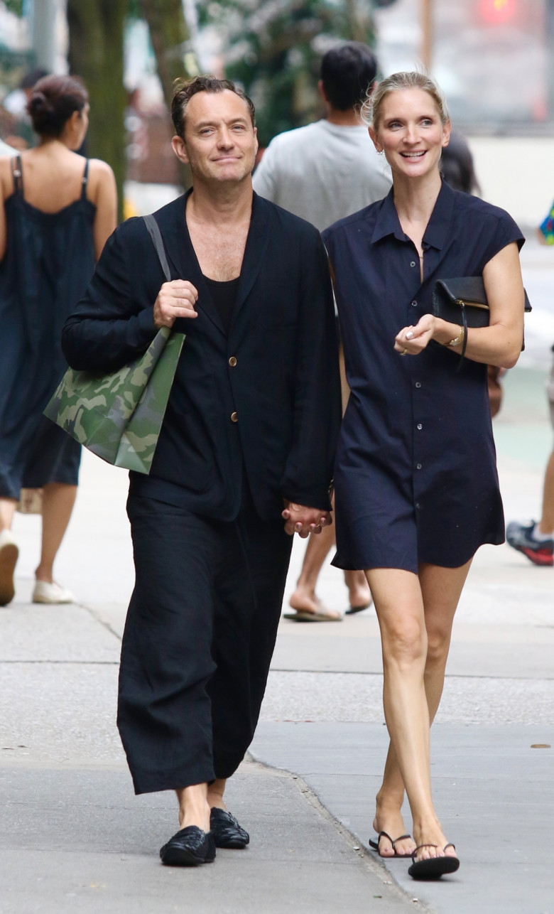 *EXCLUSIVE* Jude Law and Phillipa Coan hold hands during a romantic stroll in New York