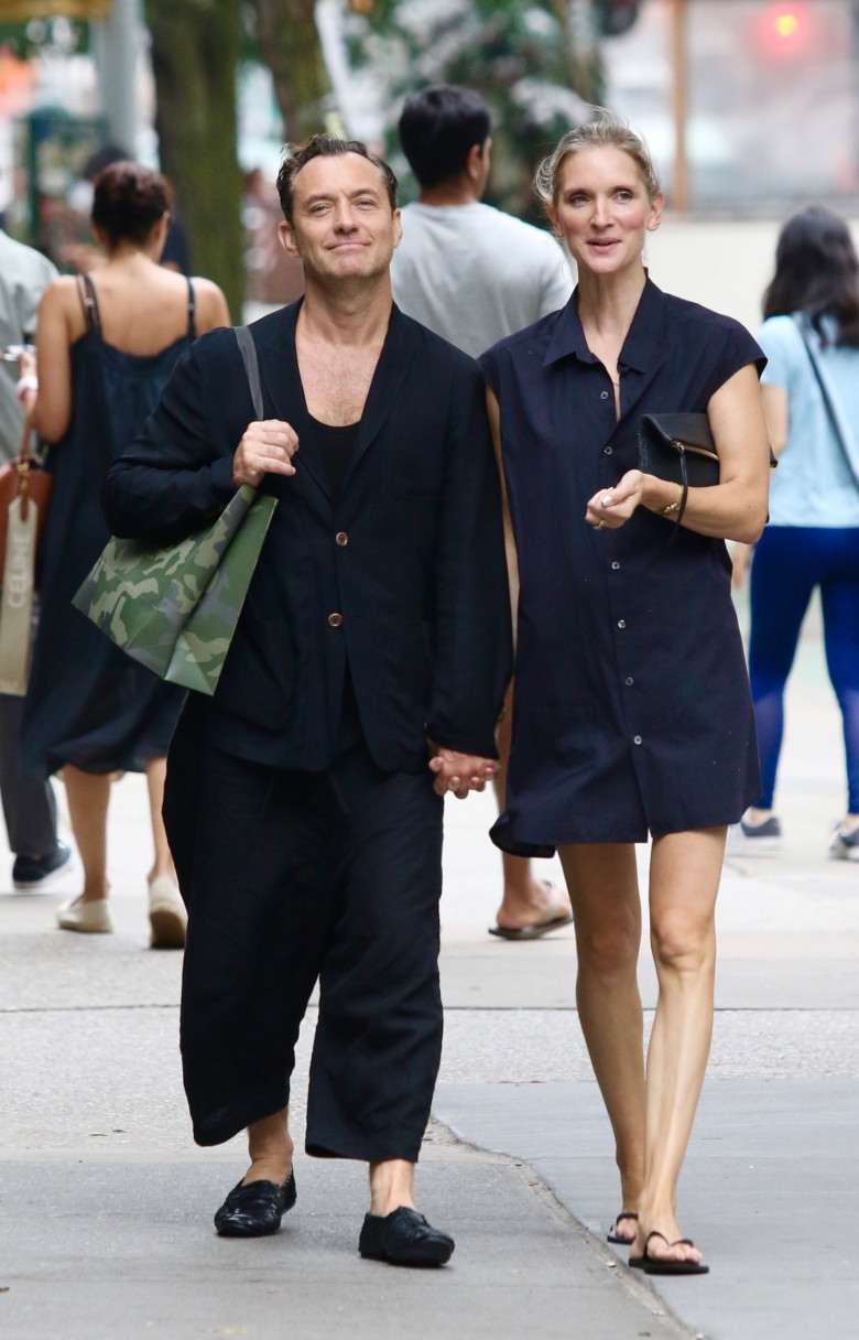 *EXCLUSIVE* Jude Law and Phillipa Coan hold hands during a romantic stroll in New York