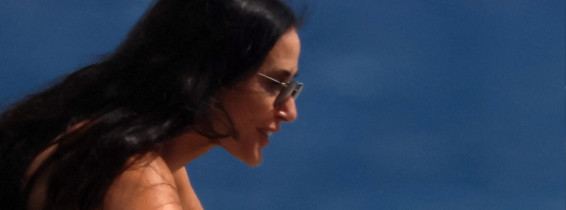 EXCLUSIVE: Demi Moore with her pet pup Pilaf while vacationing in Greece.