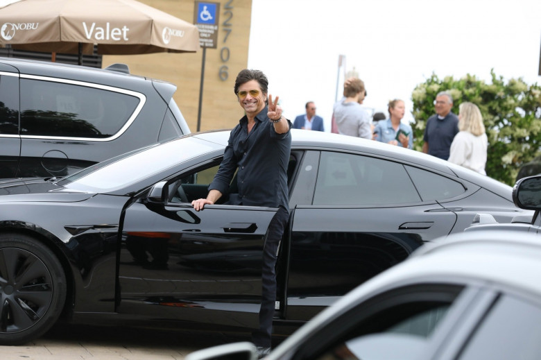 *EXCLUSIVE* John Stamos Exits Solo Sunday Lunch at Nobu in High Spirits!