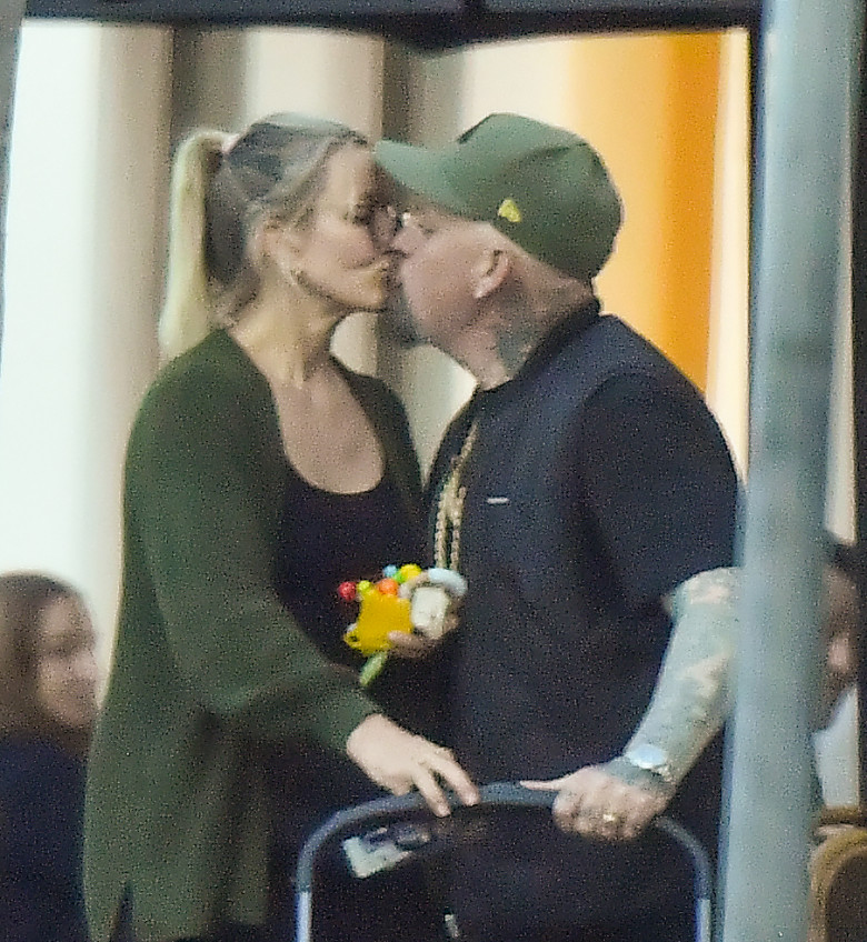 EXCLUSIVE: Cameron Diaz and husband Benji Madden share a sweet kiss as they leave a restaurant in Montecito Ca