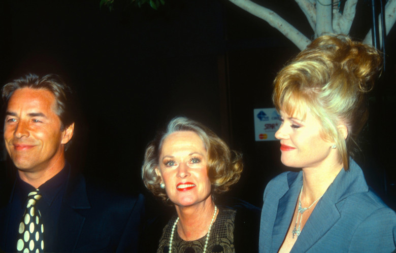 WESTWOOD, CA - JANUARY 24: (L-R) Actor Don Johnson actress Tippi Hedren and daughter actress Melanie Griffith attend the 'Shining Through' Westwood Premiere on January 24, 1992 at the Avco Center Cinemas in Westwood, California. Photo by Barry King/Alamy