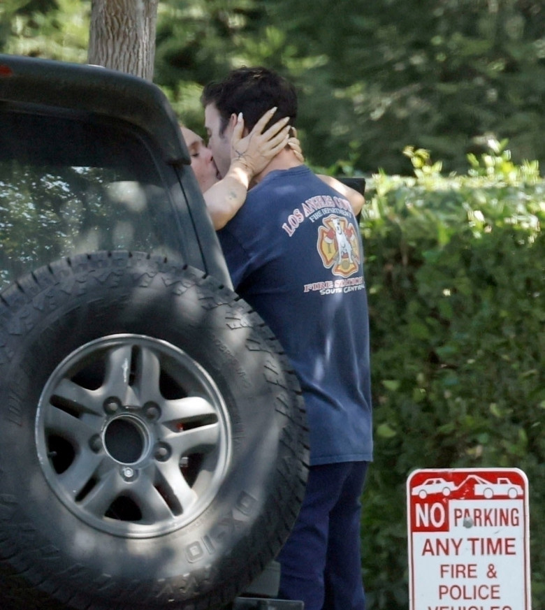 *EXCLUSIVE* HOT PDA With New Man! Rumer Willis Makes Out with Mystery Firefighter in LA Behind Her Car After Derek Richard Thomas Split **WEB MUST CALL FOR PRICING**