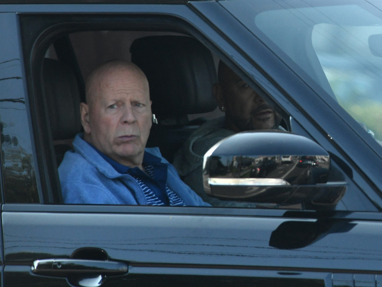 EXCLUSIVE: Bruce Willis is seen while being driven through the streets of Brentwood, Ca