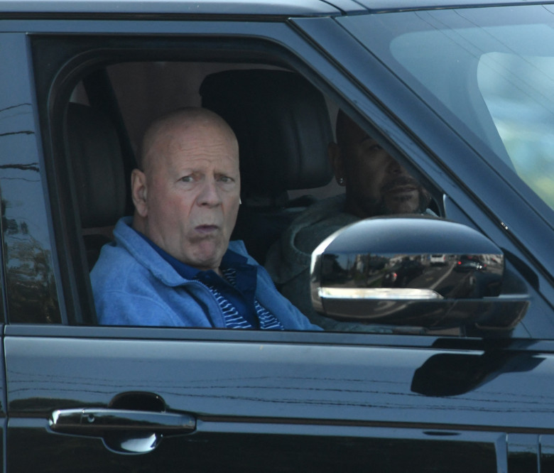 EXCLUSIVE: Bruce Willis is seen while being driven through the streets of Brentwood, Ca