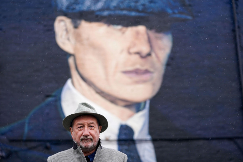 Peaky Blinders creator Steven Knight at the unveiling of a mural by artist Akse P19, of actor Cillian Murphy, as Peaky Blinders crime boss Tommy Shelby, in the historic Deritend area of Birmingham, ahead of the sixth and final series of the hit BBC One cr