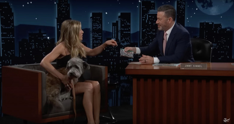 Jennifer Aniston dispels the wildest rumours ever written about her – before bringing out her cute dog Clydeo to help promote her new children’s book on Jimmy Kimmel Live!