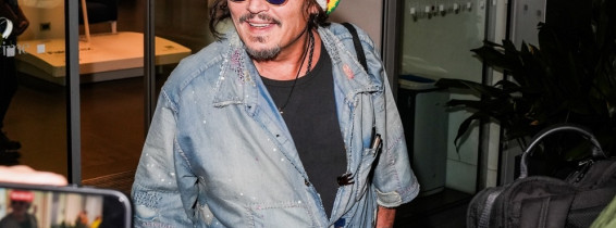 Johnny Depp steps out the Milan airport after the Rome film festival before a TV interview on channel 9