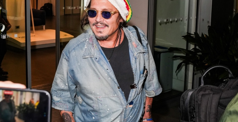 Johnny Depp steps out the Milan airport after the Rome film festival before a TV interview on channel 9