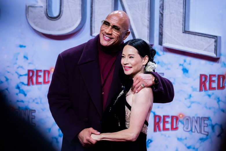 Berlin, Germany. 03rd Nov, 2024. Dwayne Johnson, actor, and Lucy Liu, actress, come to the UCI Luxe cinema for the world premiere of the film "Red One - Christmas Alert". Credit: Christoph Soeder/dpa/Alamy Live News