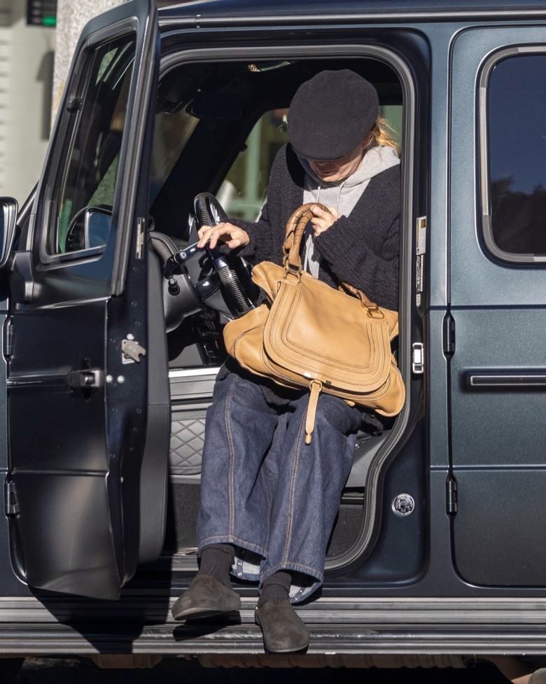 *EXCLUSIVE* Going Grey! Ellen Pompeo looks unrecognizable as she grabs coffee looking super casual