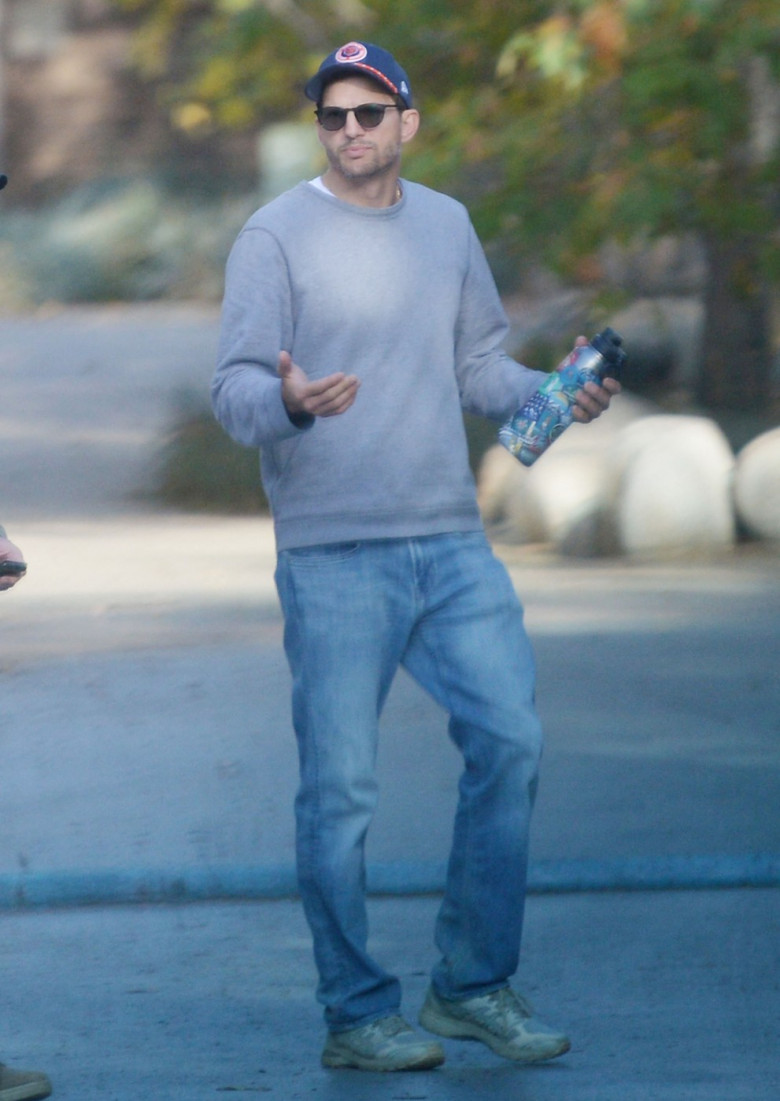 EXCLUSIVE: Ashton Kutcher looks downcast during a hike with a pal as divorce rumors swirl amid Diddy's sex trafficking case.