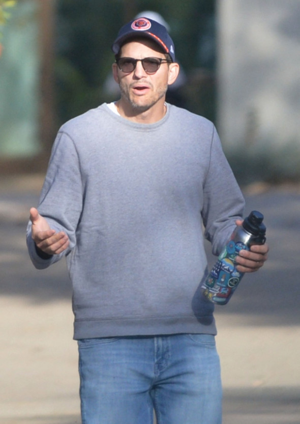 EXCLUSIVE: Ashton Kutcher looks downcast during a hike with a pal as divorce rumors swirl amid Diddy's sex trafficking case.