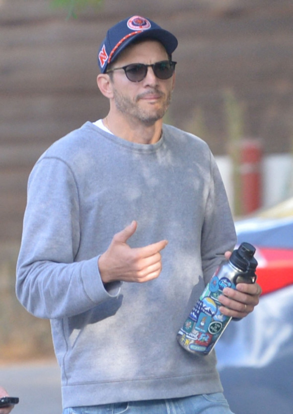 EXCLUSIVE: Ashton Kutcher looks downcast during a hike with a pal as divorce rumors swirl amid Diddy's sex trafficking case.