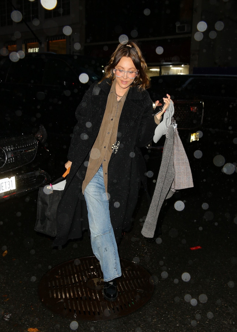 Kaley Cuoco spotted arriving at her hotel in rainy New York