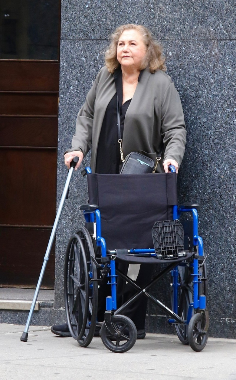 *EXCLUSIVE* A rarely seen Kathleen Turner was seen walking with the help of a cane and holding onto a wheelchair