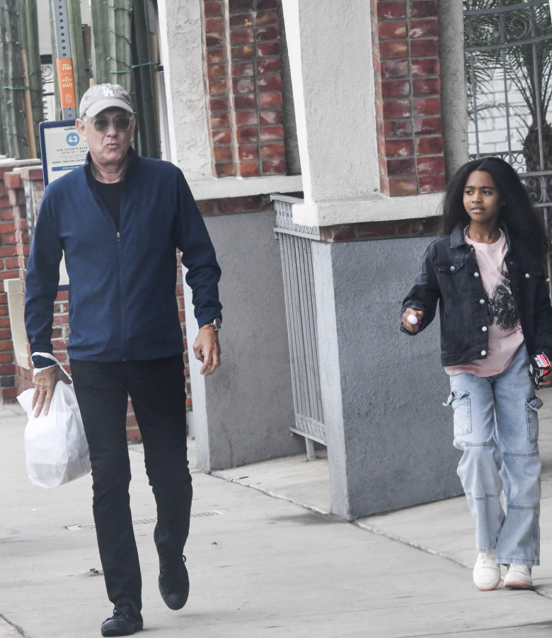 EXCLUSIVE: Tom Hanks Spotted On Grandparent Duty With Granddaughter Michaiah In Brentwood, California - 25 Nov 2024