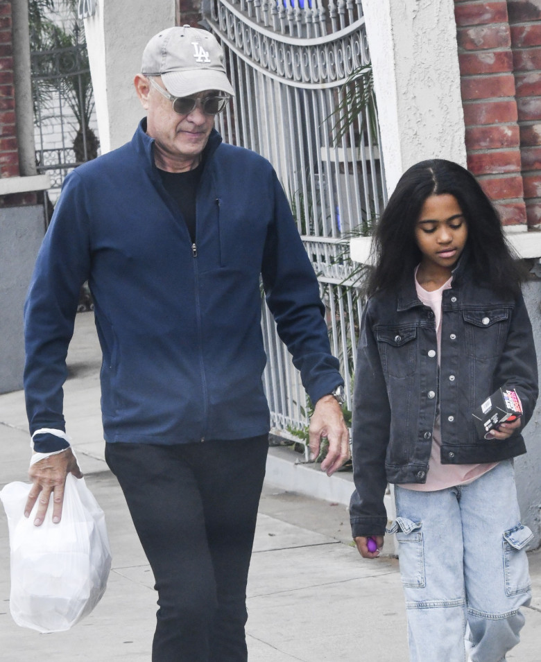 EXCLUSIVE: Tom Hanks Spotted On Grandparent Duty With Granddaughter Michaiah In Brentwood, California - 25 Nov 2024