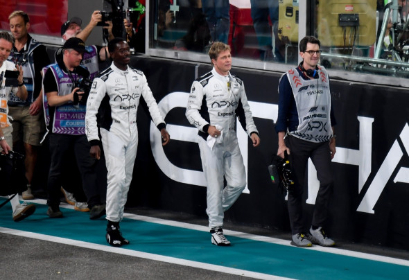 Brad Pitt and cast seen filming scenes for his latest film "F1" x at Yas Marina Circuit on December 8, 2024 in Abu Dhabi, United Arab Emirates.