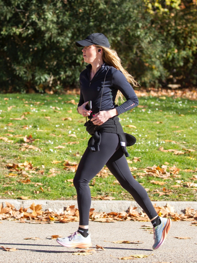 American actress Amber Heard is all smiles while out jogging in Madrid after announcing she is expecting her second child