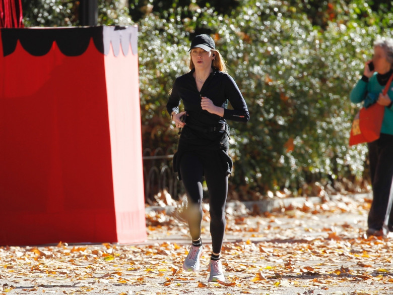 American actress Amber Heard is all smiles while out jogging in Madrid after announcing she is expecting her second child