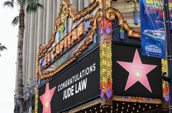 Jude Law seen all smiles getting his Hollywood Star joined by family despite activist trying to crash his ceremony