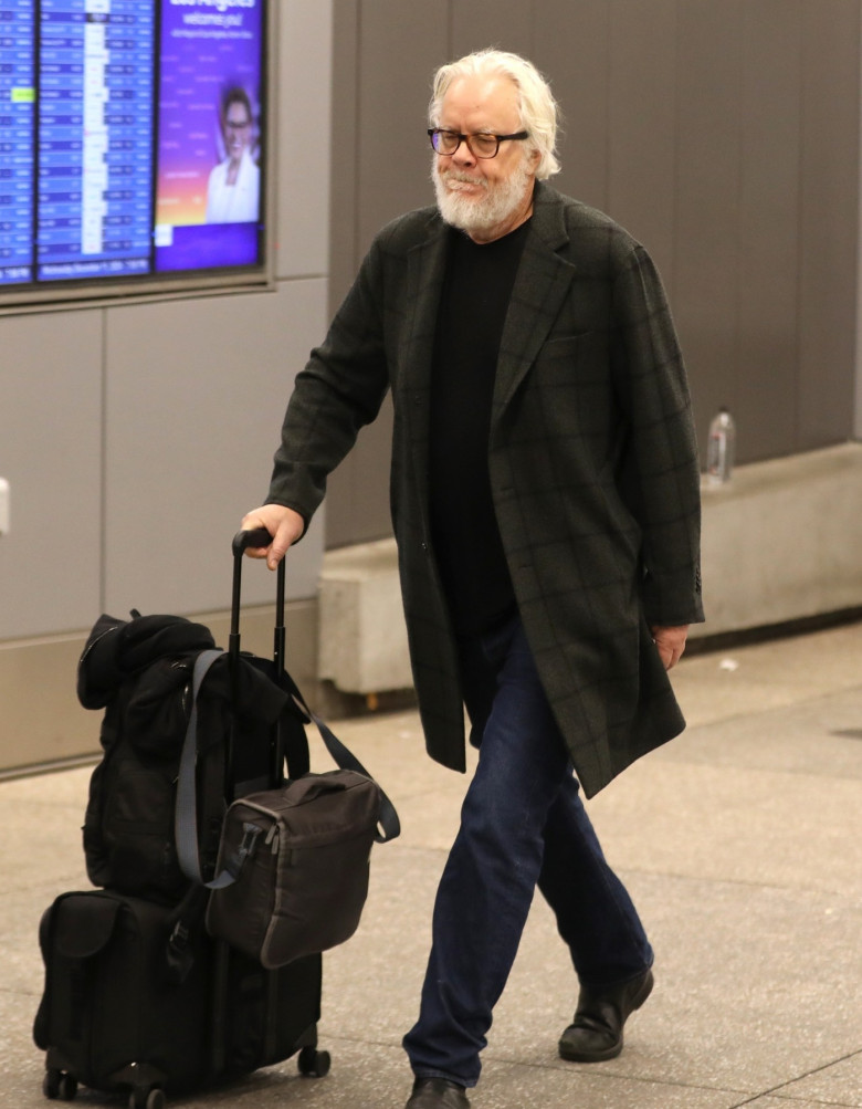 *EXCLUSIVE* Tim Robbins spotted with a bushy beard, looking unrecognizable at LAX