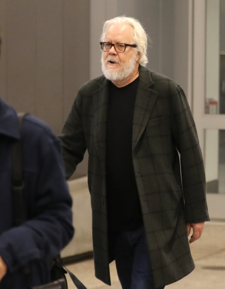 *EXCLUSIVE* Tim Robbins spotted with a bushy beard, looking unrecognizable at LAX