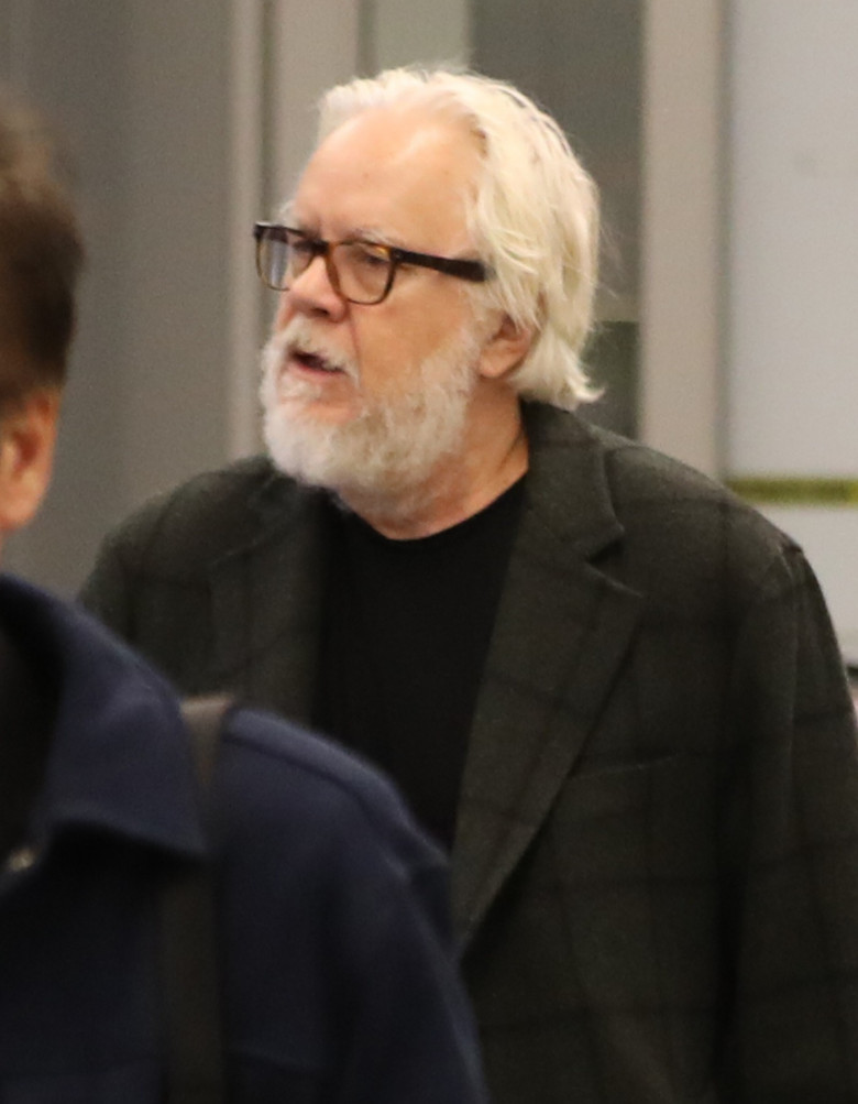 *EXCLUSIVE* Tim Robbins spotted with a bushy beard, looking unrecognizable at LAX