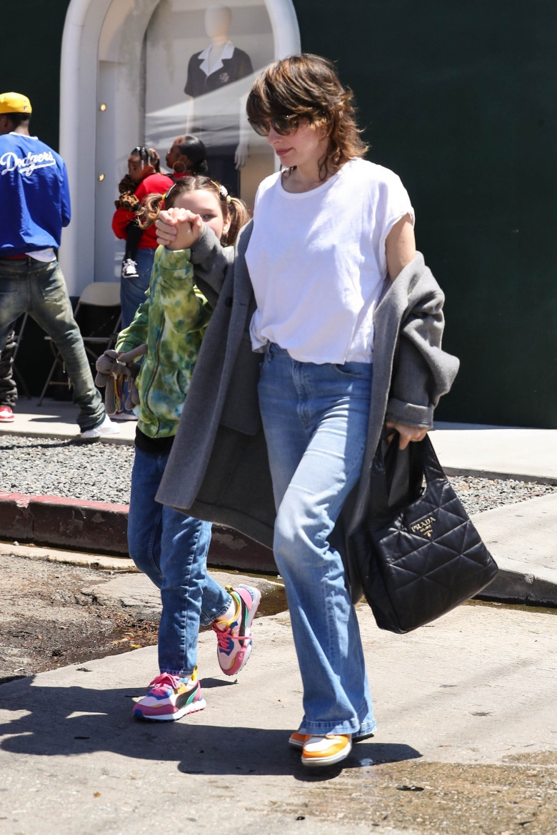 *EXCLUSIVE* Milla Jovovich steps out for some retail therapy with her daughter in WeHo!