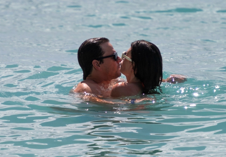 *PREMIUM-EXCLUSIVE* *MUST CALL FOR PRICING* Actor Mark Wahlberg and wife Rhea show of their sizzling beach bodies