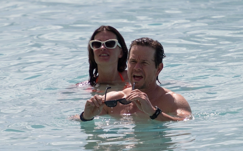 *PREMIUM-EXCLUSIVE* *MUST CALL FOR PRICING* Actor Mark Wahlberg and wife Rhea show of their sizzling beach bodies