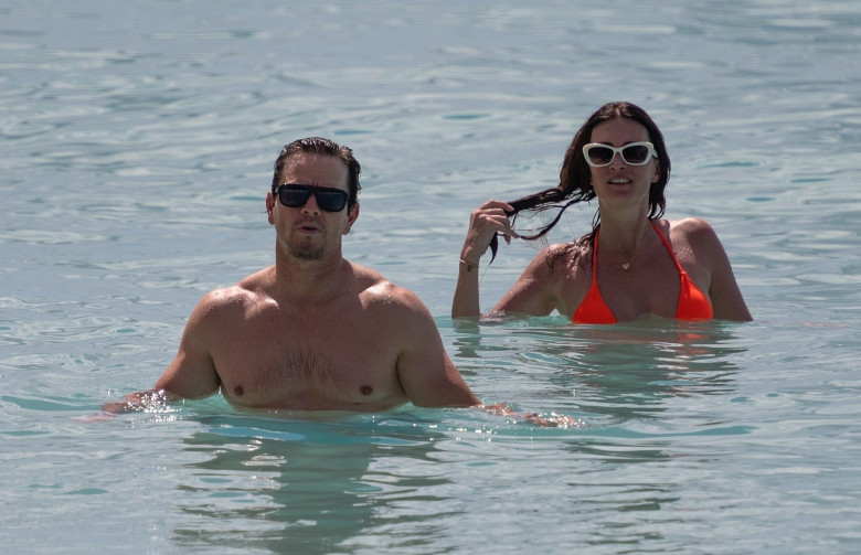 *PREMIUM-EXCLUSIVE* *MUST CALL FOR PRICING* Actor Mark Wahlberg and wife Rhea show of their sizzling beach bodies