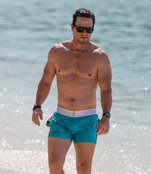 *PREMIUM-EXCLUSIVE* *MUST CALL FOR PRICING* Actor Mark Wahlberg and wife Rhea show of their sizzling beach bodies