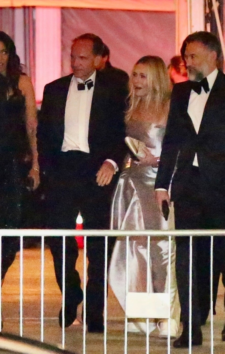 Ralph Fiennes and Chelsea Handler spark romance rumors leaving Vanity Fair Oscar Party hand in hand