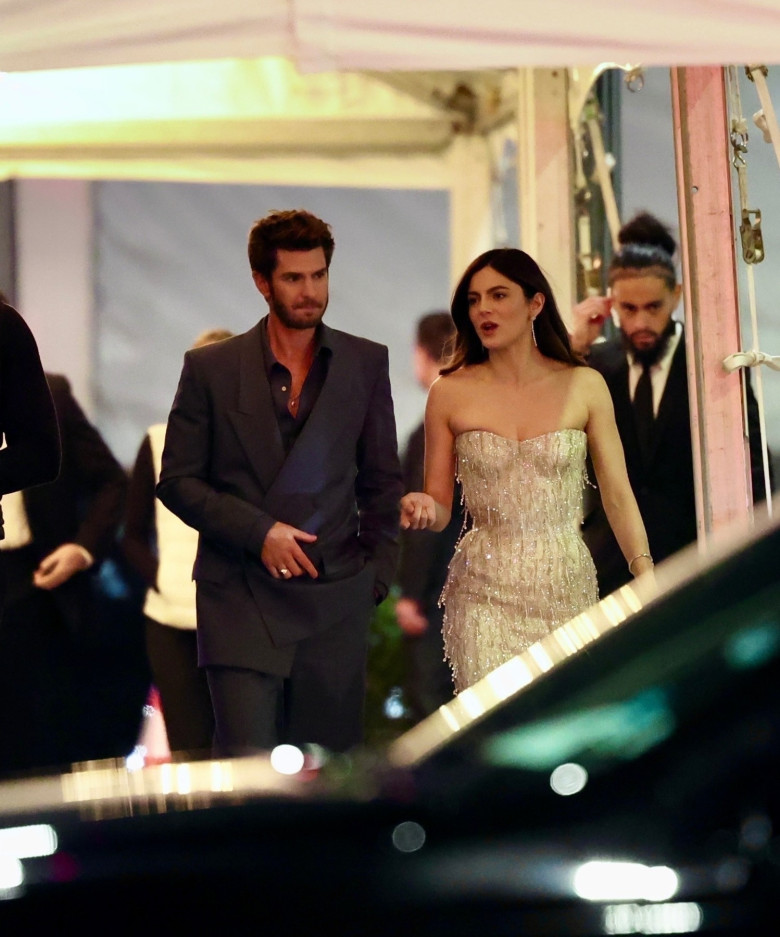 Andrew Garfield and Monica Barbaro are pictured after attending the Vanity Fair party