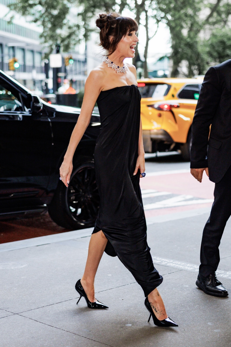 Dakota Johnson exudes elegance in a black Ferragamo dress at the Global Ambassadorship Celebration in NYC