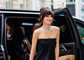 Dakota Johnson exudes elegance in a black Ferragamo dress at the Global Ambassadorship Celebration in NYC